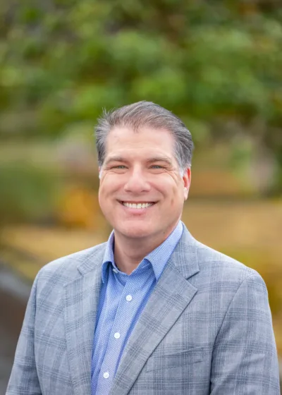 Aaron Fetzer the CFO of MacKay wearing a suit jacket