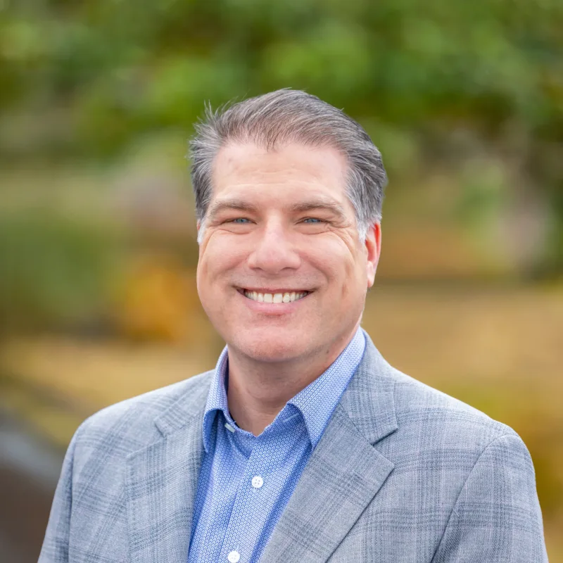 Aaron Fetzer the CFO of MacKay wearing a suit jacket