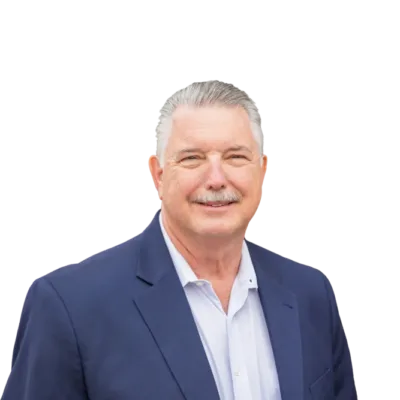 Middle-aged man with gray hair and a mustache wearing a navy blazer and light shirt